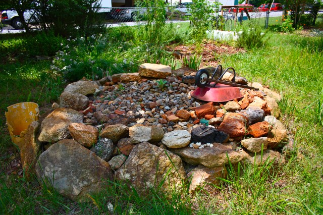 Stone Pile With Wheelbarrow